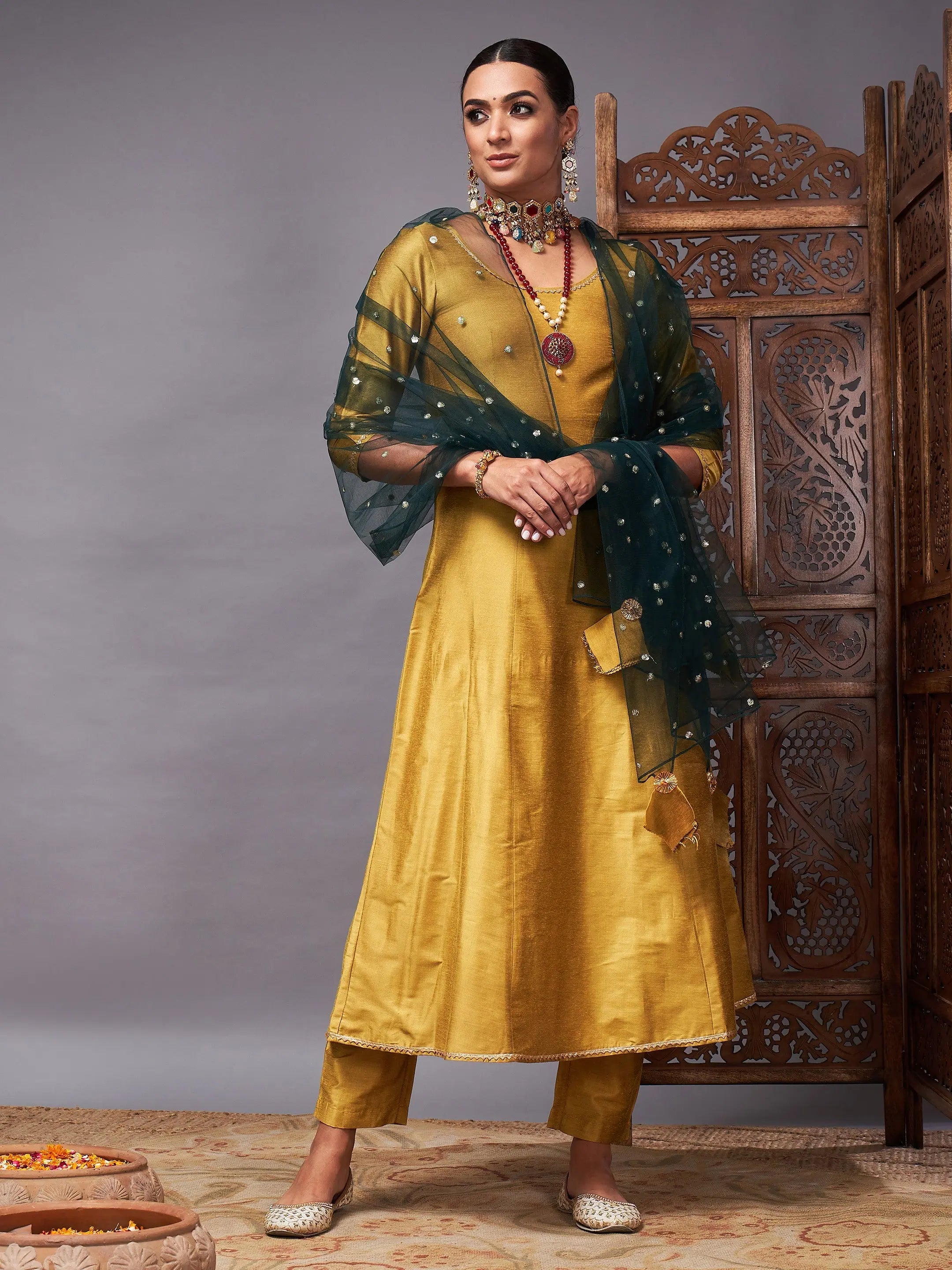 Women Mustard Kurta Set With Green Net Sequins Dupatta