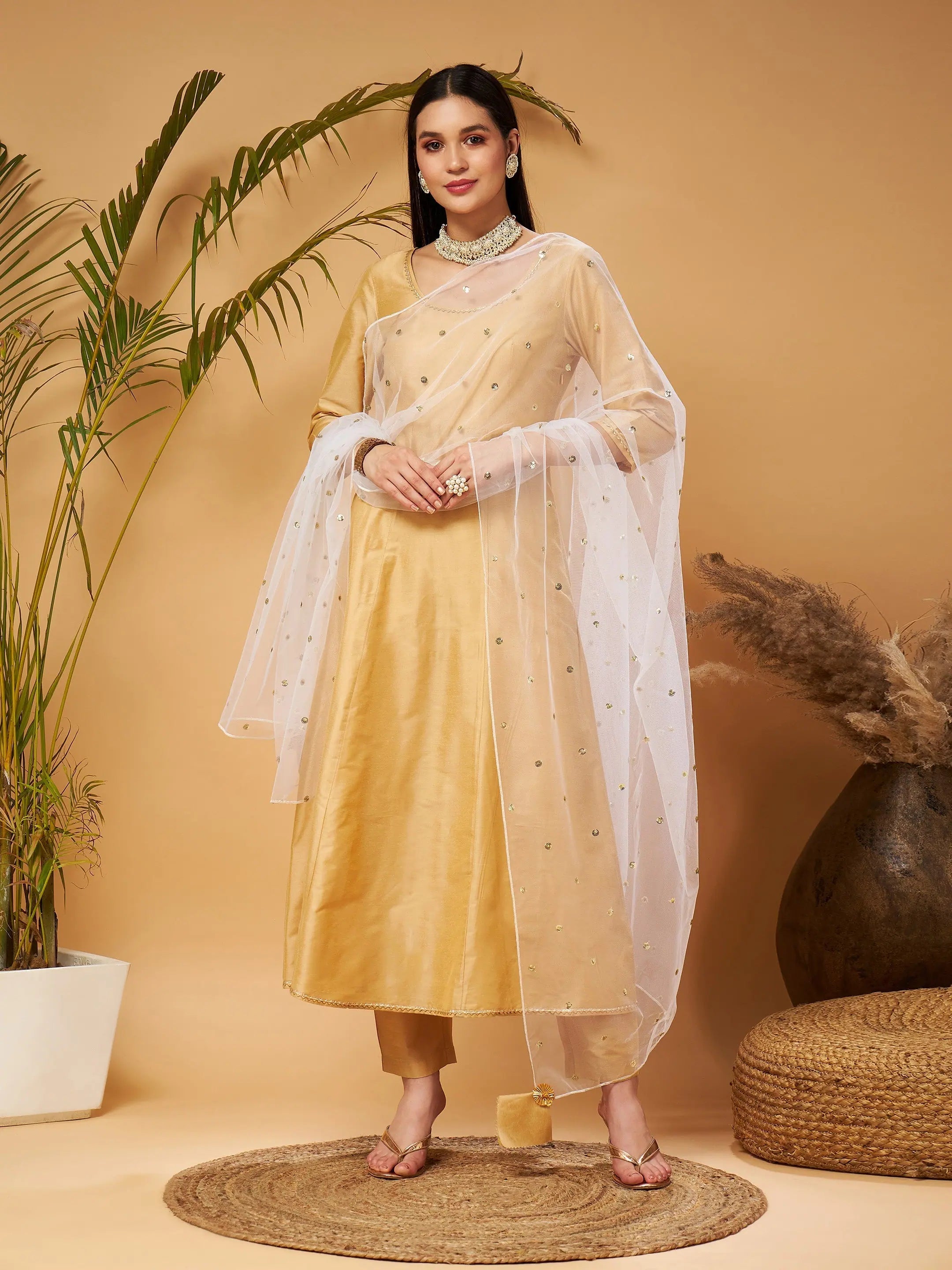 Women Gold Kurta Set With White Net Sequins Dupatta